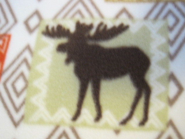 Caribou, Ducks, Bears, Wolves, Raccoons in Silhouette with Gold Fleece Blanket