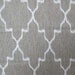 IKAT geometric  white on gray color field