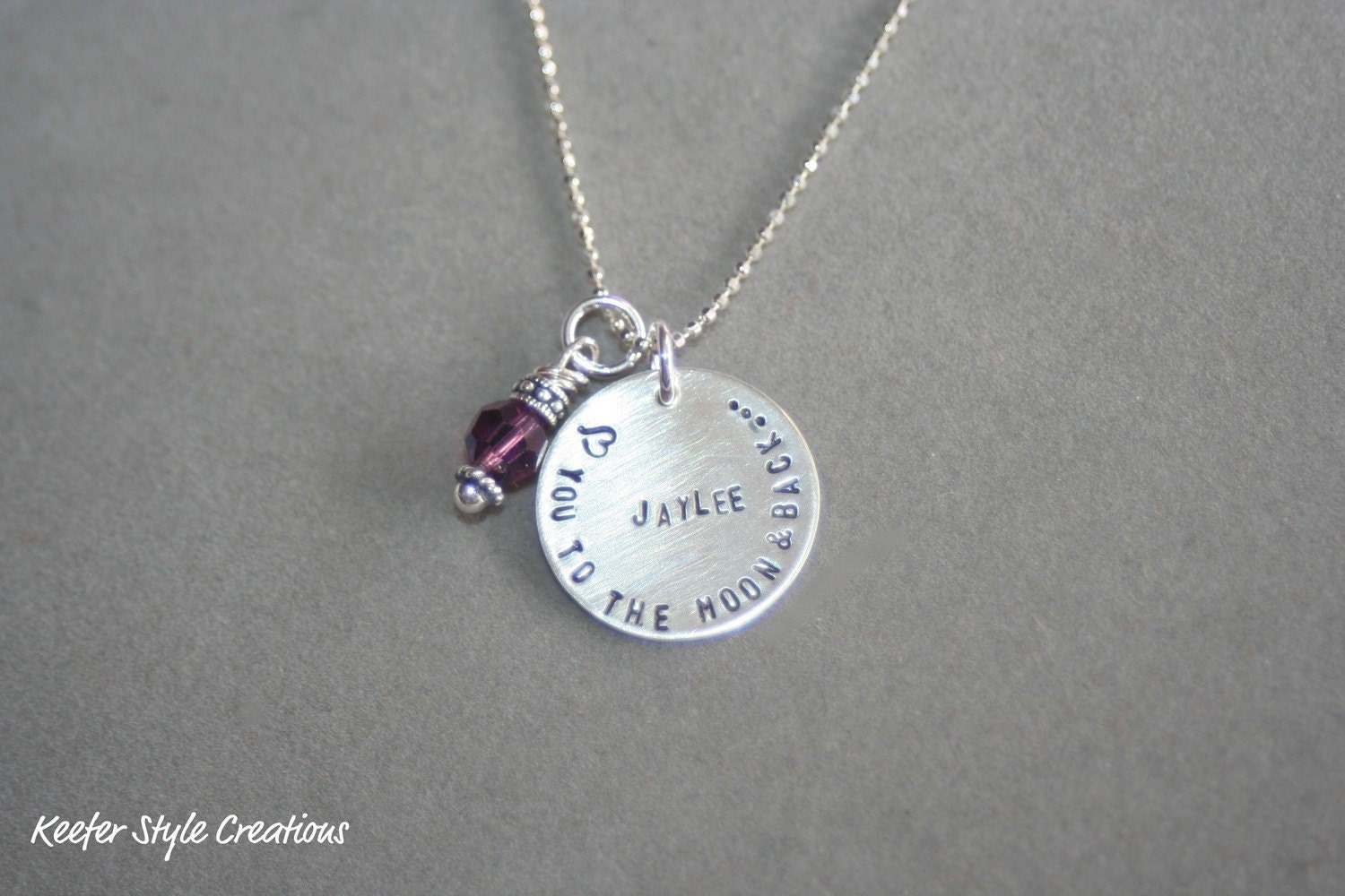 Hand stamped small circle Love you to the moon and back necklace