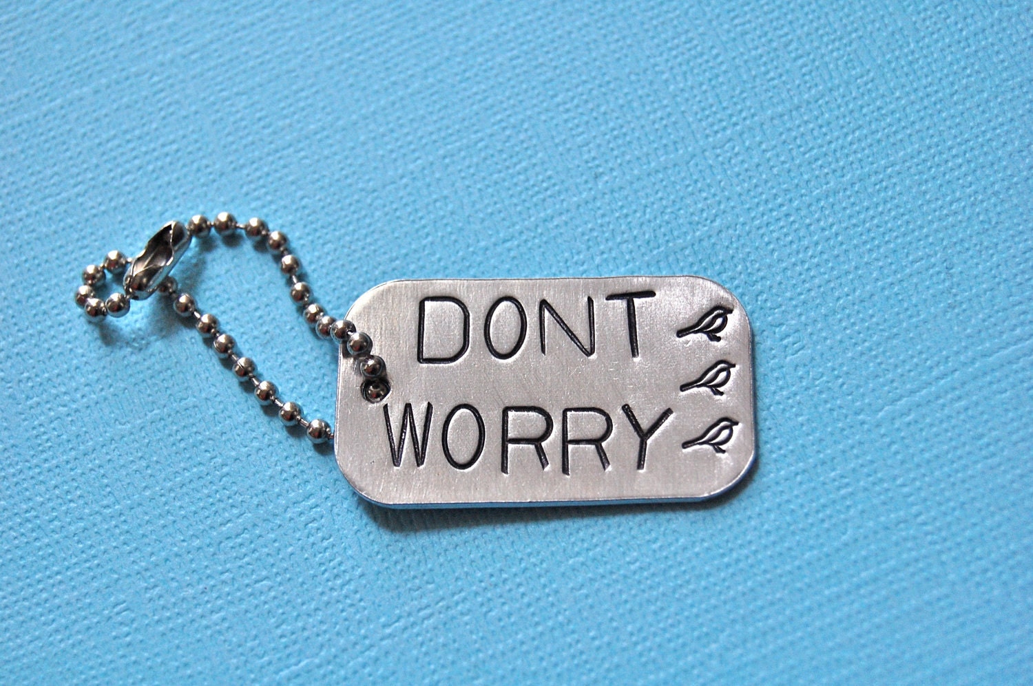 Don't Worry: bob marley 3 little birds lyrics dog tag keychain