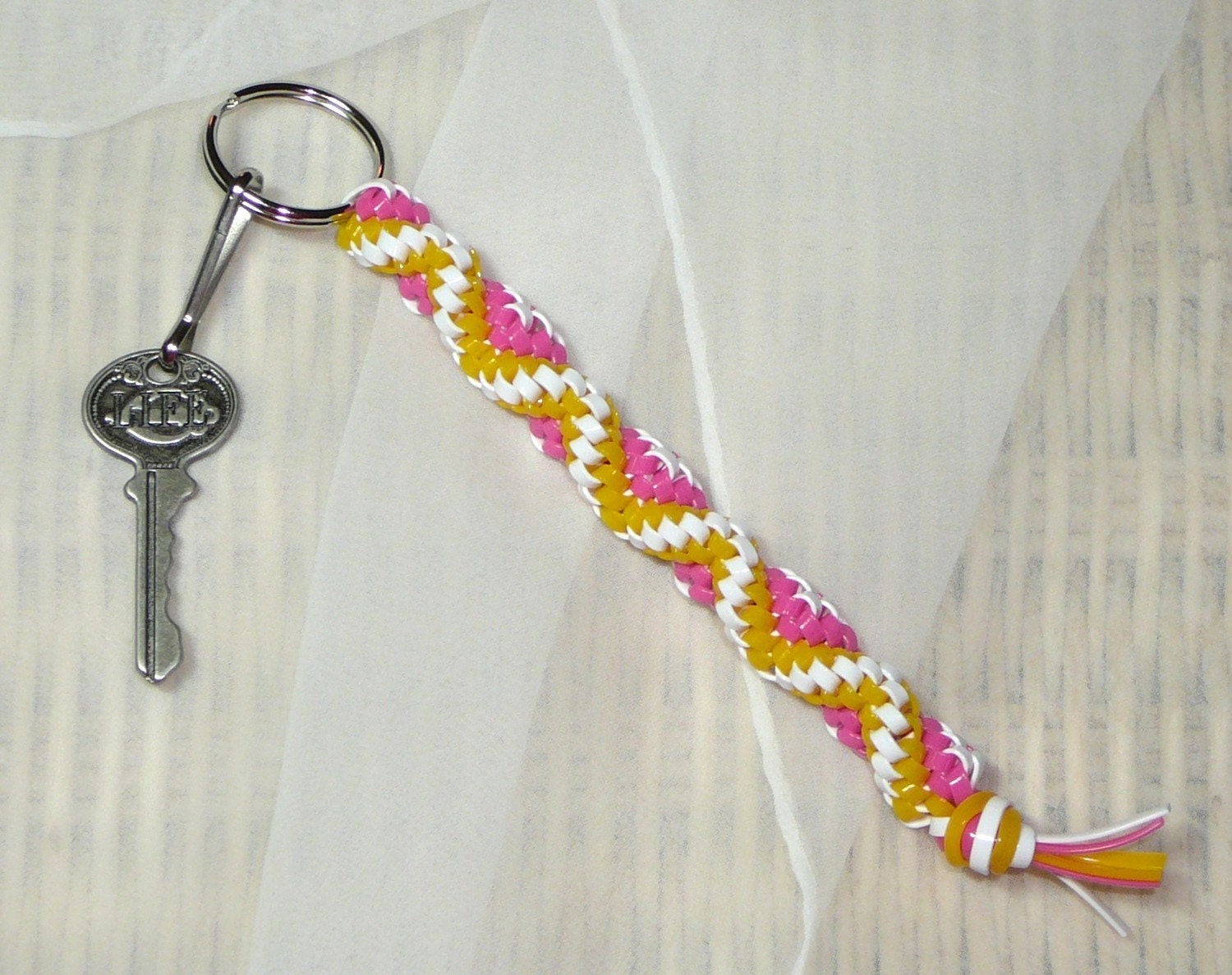 Gimp Plastic Lacing -- Strawberry Lemonade keychain