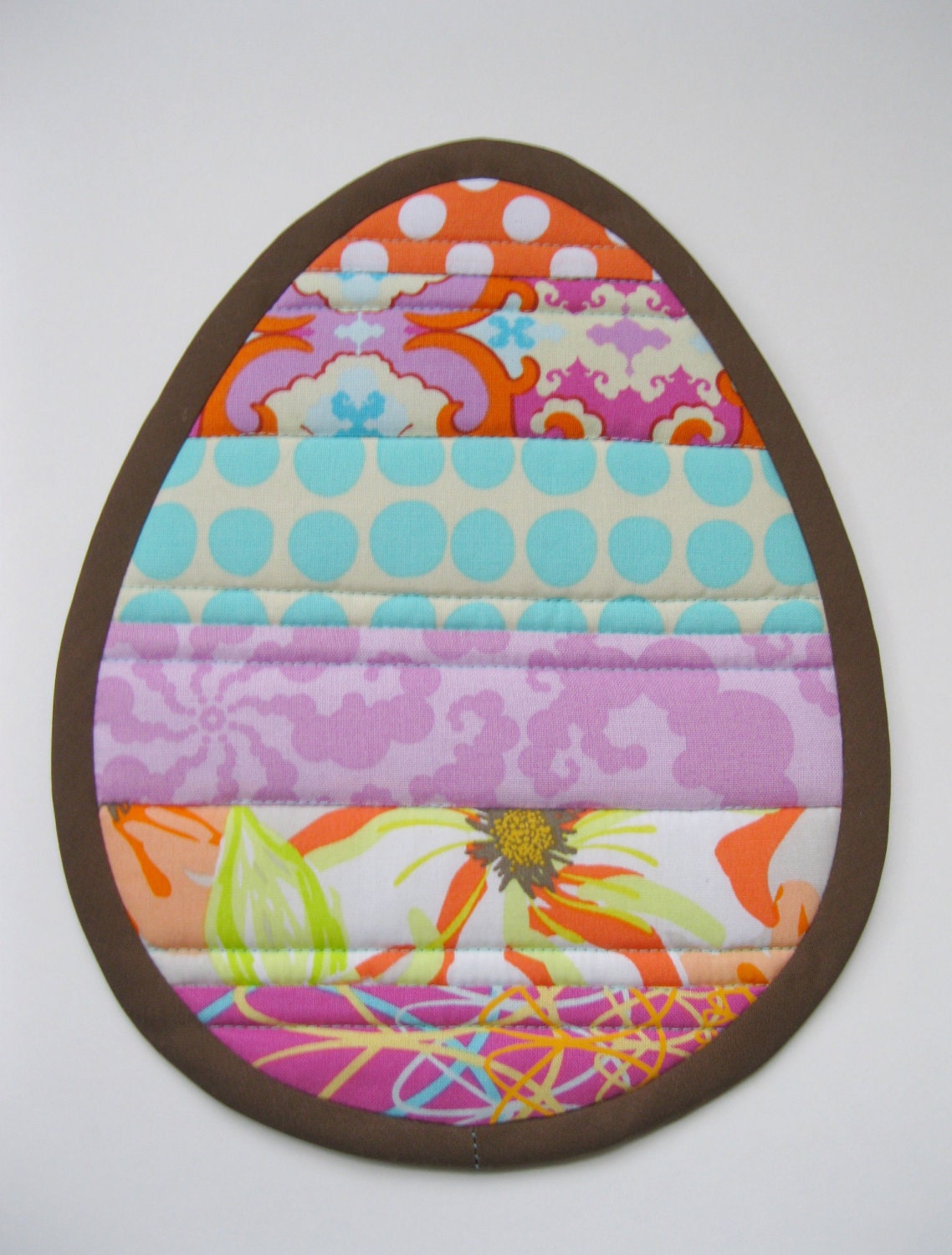 Stripey Egg Mug Rug And Potholder Tutorial and Sewing Pattern in PDF Format.