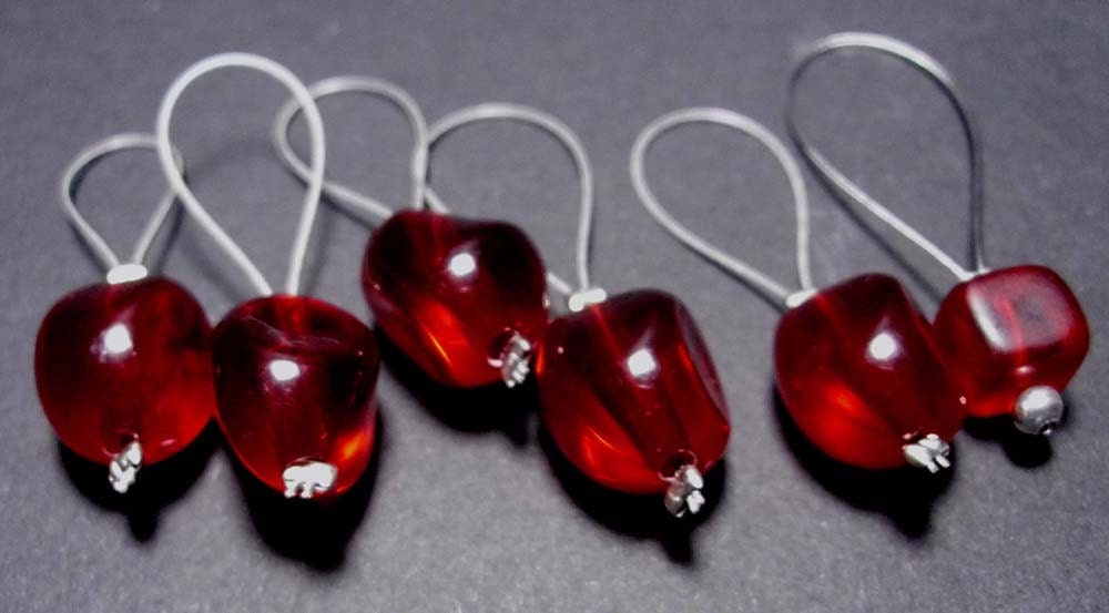 Hand-made Red stitch markers.