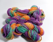Handspun Yarn in orange,green,and purple