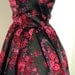 Hold for CINDY CHRISTIAN DIOR Couture 1950's vintage dress. Black Silk, Fuschia Pink Velvet Floral Print. Boned, Nipped Waist.