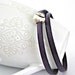 Purple double wrapped leather bracelet with magnetic tennis ball clasp