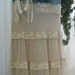 Michelle Ma Belle beige tulle vintage lace ruffled Renaissance Denim Couture bohemian jean skirt with rose and rhinestone brooch