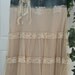 Michelle Ma Belle beige tulle vintage lace ruffled Renaissance Denim Couture bohemian jean skirt with rose and rhinestone brooch