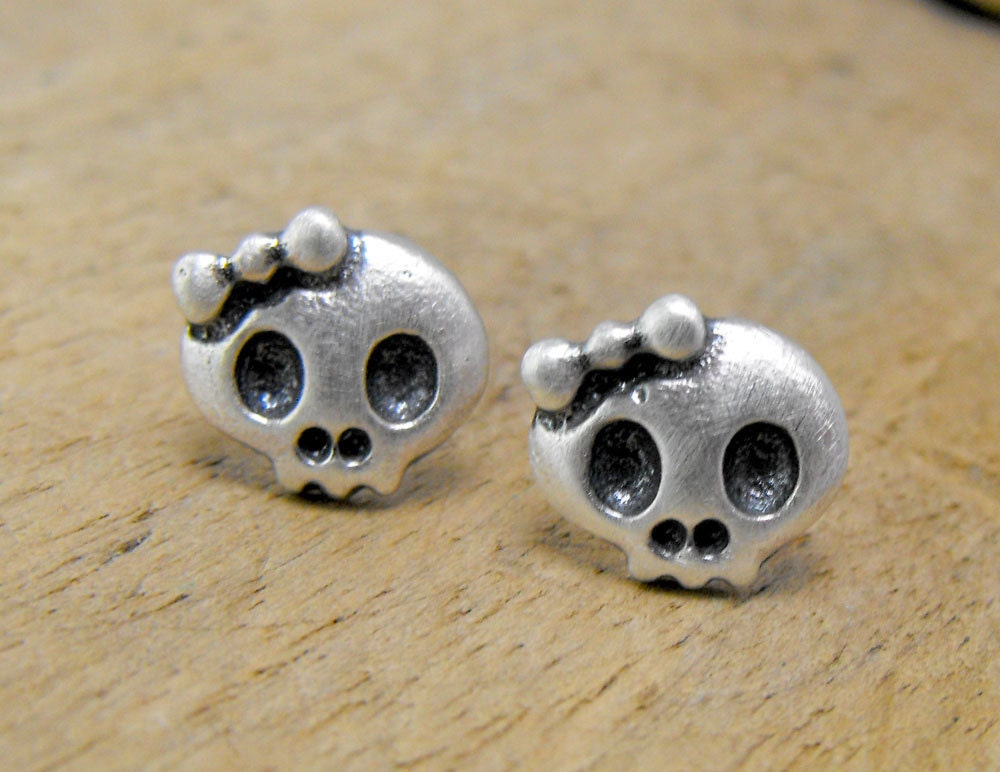 Tiny sterling silver girly skull studs with bow. Two adorable dead girls. Cute and creepy
