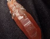 Tangerine/orange quartz crystal pendant in sterling
