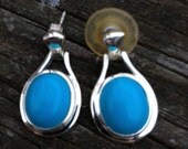 Vintage 925 sterling silver earrings with turquoise colored stone