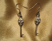 Silver tone skeleton key earrings