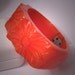 Vintage Carved Bakelite Bracelet Clamper Art Deco Floral Red-Orange