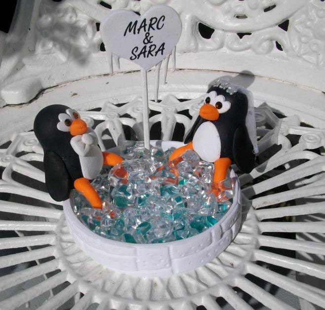 Loving penguins having a n-- ice soak