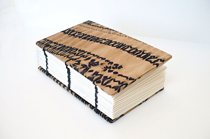 Shibori dyed silk covered blank journal in black and gold. Bound with acid free drawing paper. Guest book, diary, sketchbook. Hard cover.