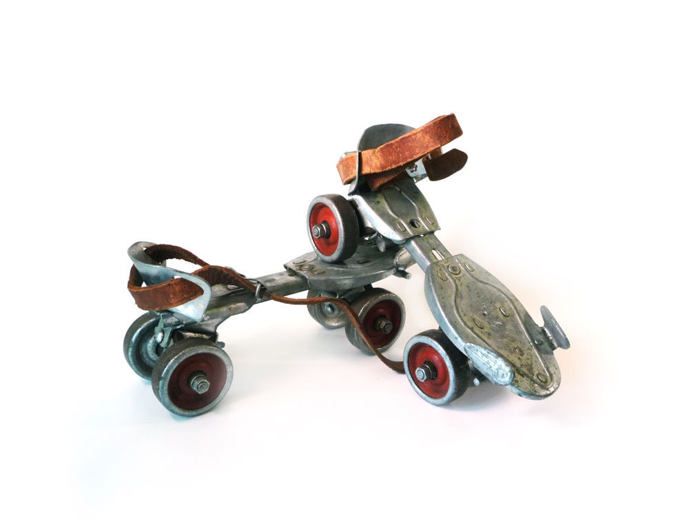 Red and silver Hustler Speed King roller skates