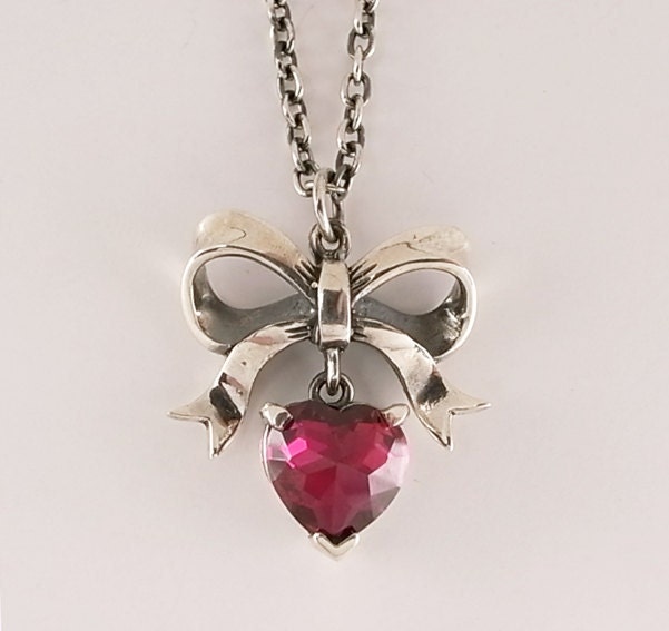 Sterling Silver Bow and Hanging Heart Cubic Zirconia Necklace