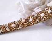 Mintook- Vintage Bracelet, with embroidered elements , round pink pearls, gold color beads, all stitched to a ribbon lace.
