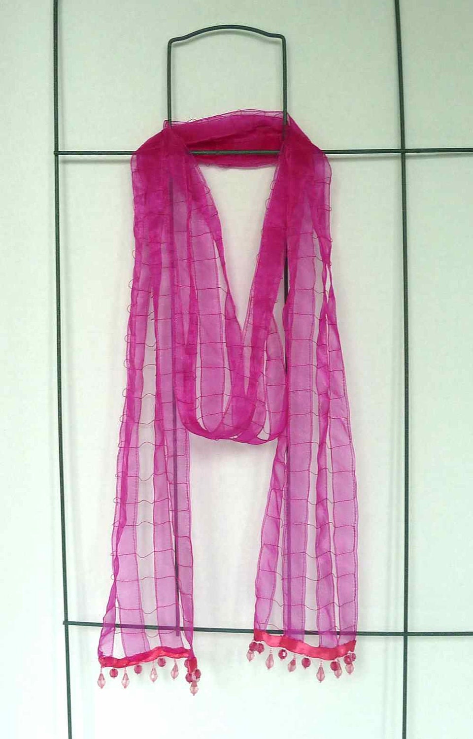Bright pink ribbon scarf