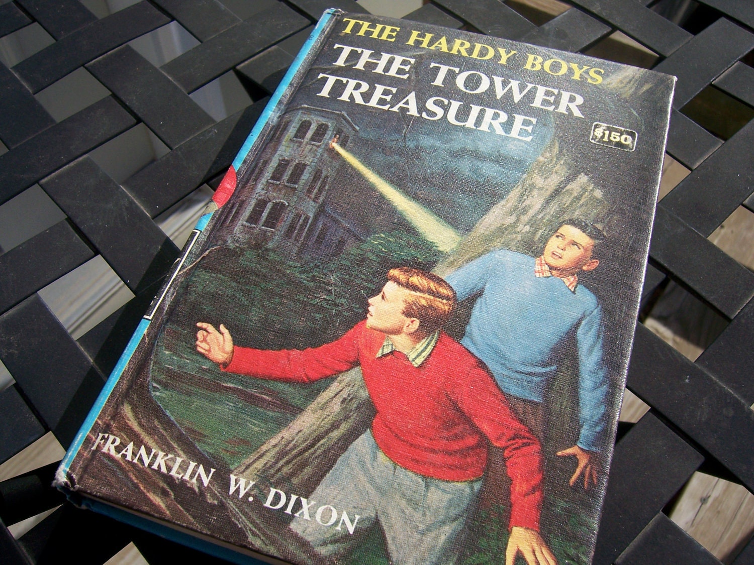 Vintage collectible book The Hardy Boys The Tower Treasure adds mystery and adventure to back to school days