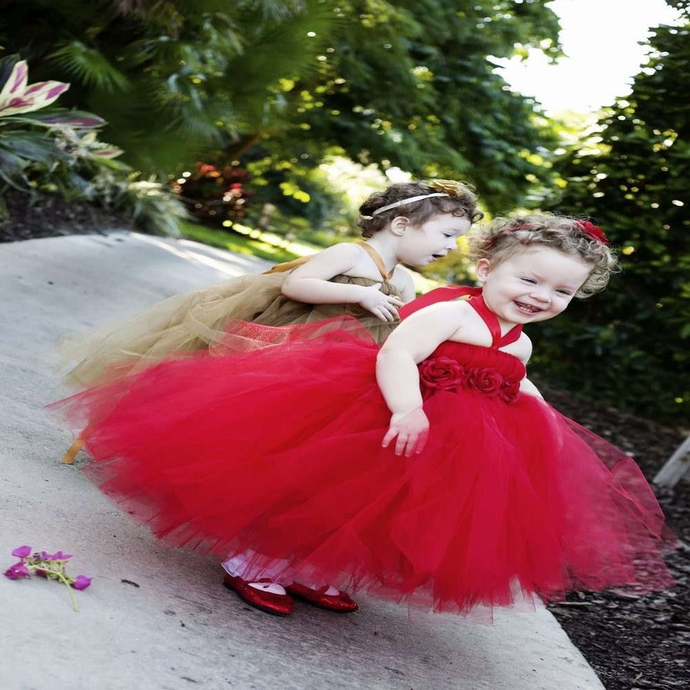 Classy red tutu dress available in red and gold. Available sizes newborn to 24 months.
