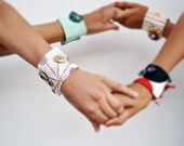 Cuff bracelet from white and cream fabric with buttons-vintage