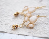 Gypsy Queen-- faceted stone tri settings with bronze czech glass beads.  Gold and Cream