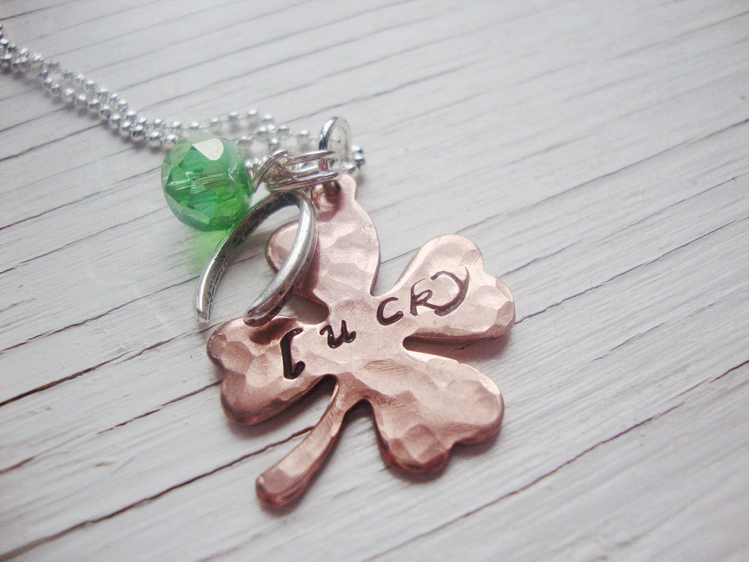 Feelin lucky handstamped copper shamrock necklace with wishbone and green czech bead