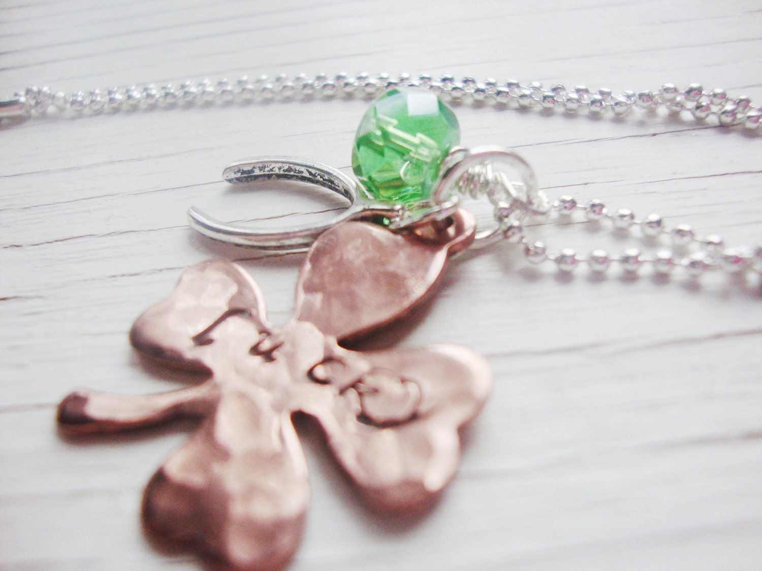Feelin lucky handstamped copper shamrock necklace with wishbone and green czech bead