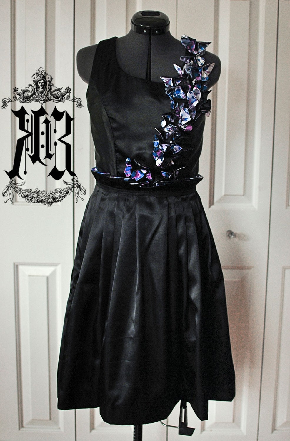 Gloria - Black satin dress with contrast butterflies.
