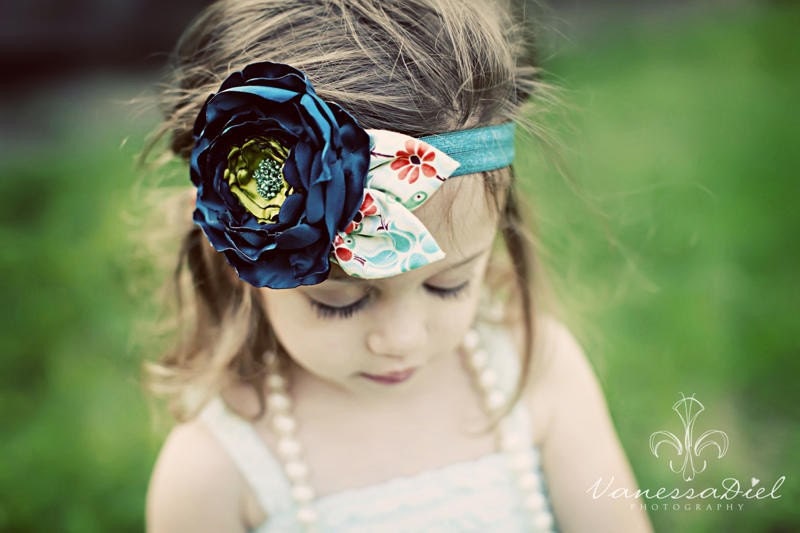Teal Blue & Avocado Green Silky Satin Fabric Flower with Patterned Leaves on a Soft Stretchy Headband