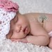 NEWBORN Hat, 0 to 1 Months Baby Girl Hat, Baby Crochet Flapper Beanie, White with Rose Pink and Yellow Flower. Great for Photography Props.