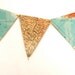 Recycled vintage map bunting or garland. Shabby chic home decor. Bookshelf accent.