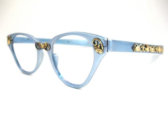 TURA sky blue cat eye glasses. gold embellishments. ornate. 1950s retro eyewear. aluminum and gold. no lenses. (VFAC)