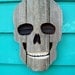 Skull made of recycled wood and plastic, upcycled fence wood