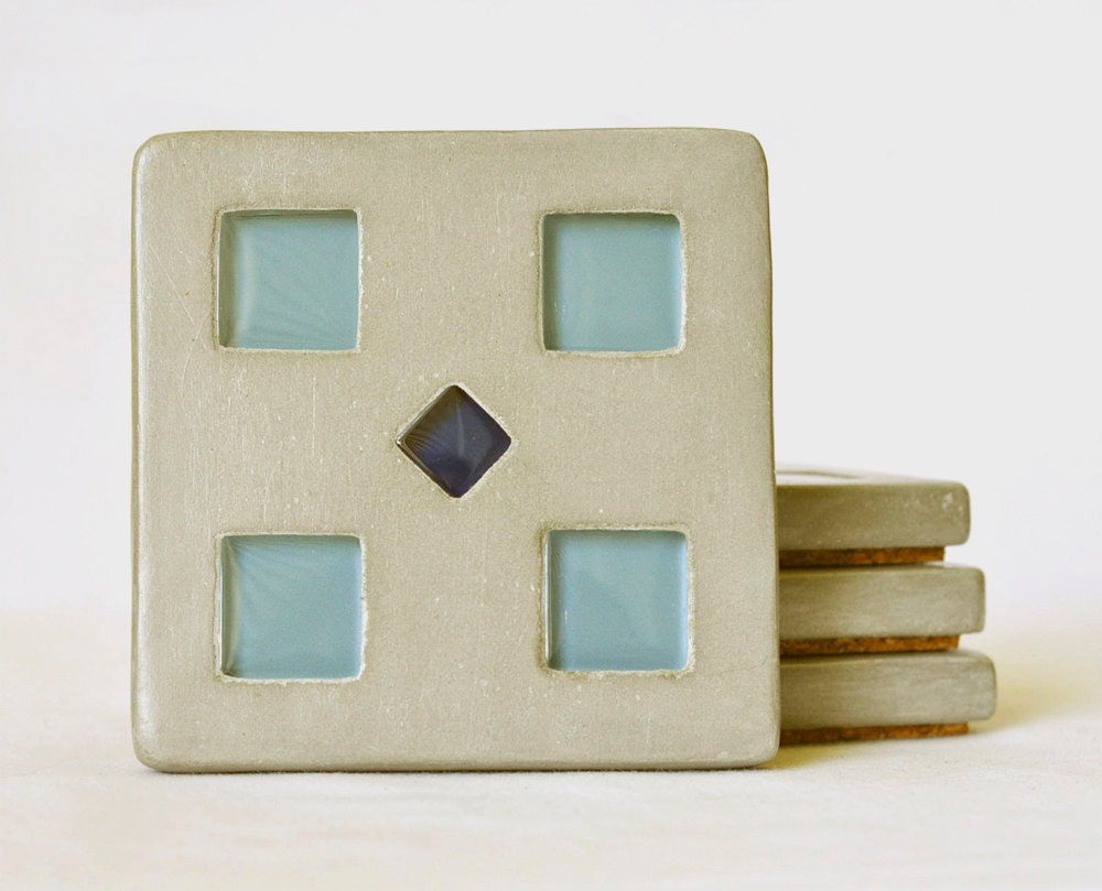 Concrete Coasters with dark blue and light blue tile inlay