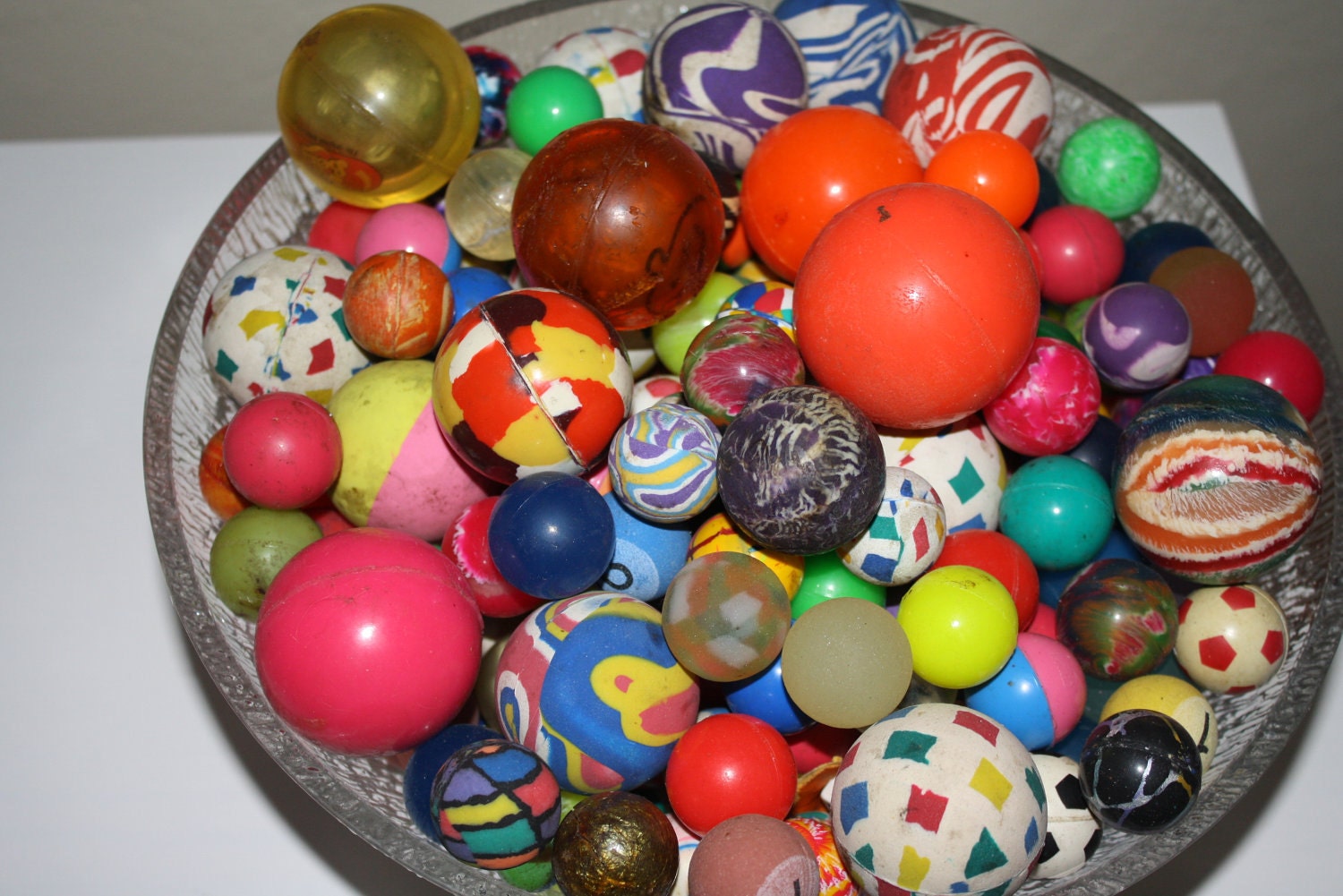 Vintage Bouncy Balls Bowl of colorful one of a kind bouncy balls large and small Retro art panton