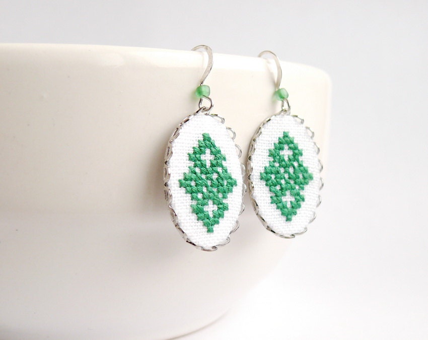 Green textile earrings with Ukrainian cross stitch ornament with surgical steel ear wires