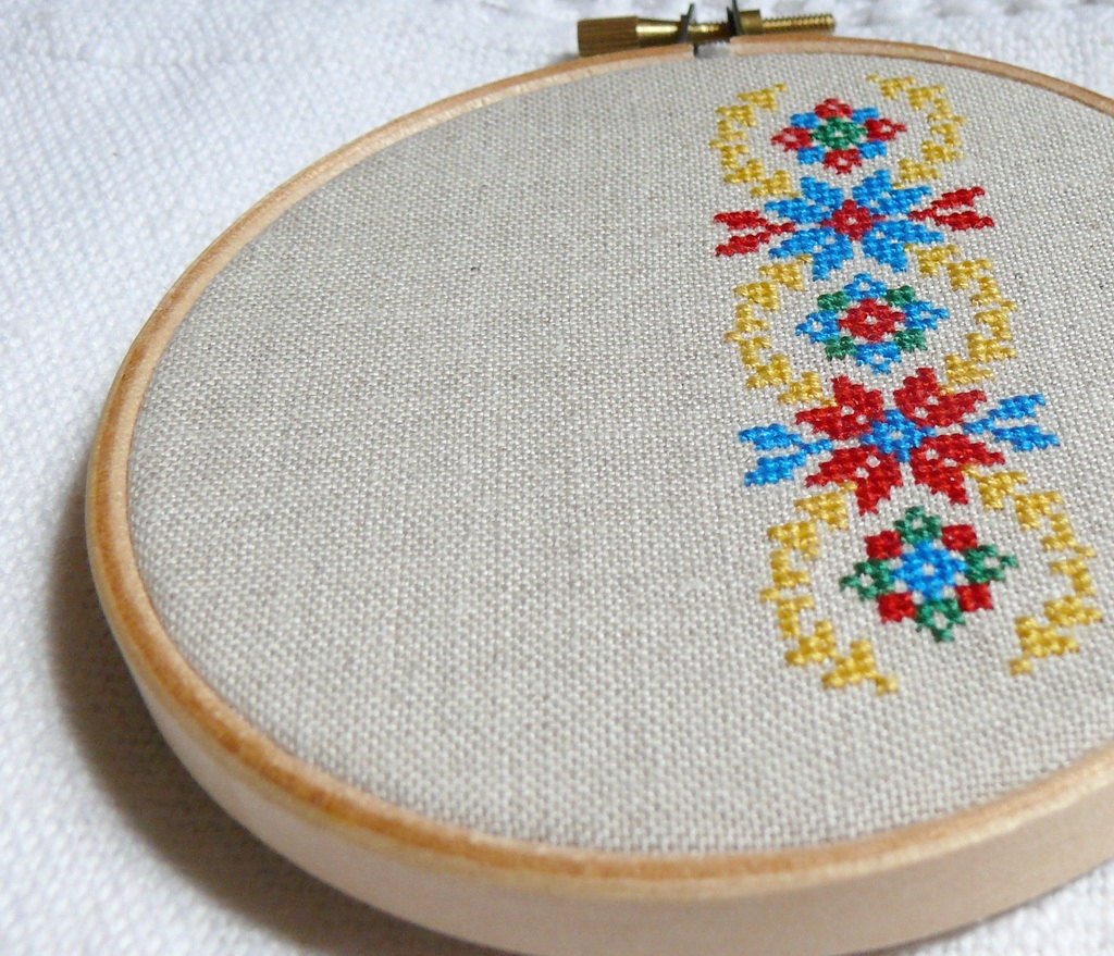 Ukrainian ornament hand embroidery cross stitch in wooden hoop