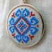 Cross stitch necklace blue and red ethnic ornament