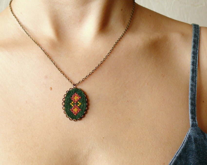 Cross stitch necklace Ukrainian ornament on dark green felt