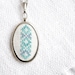 Hand embroidered necklace melange light blue