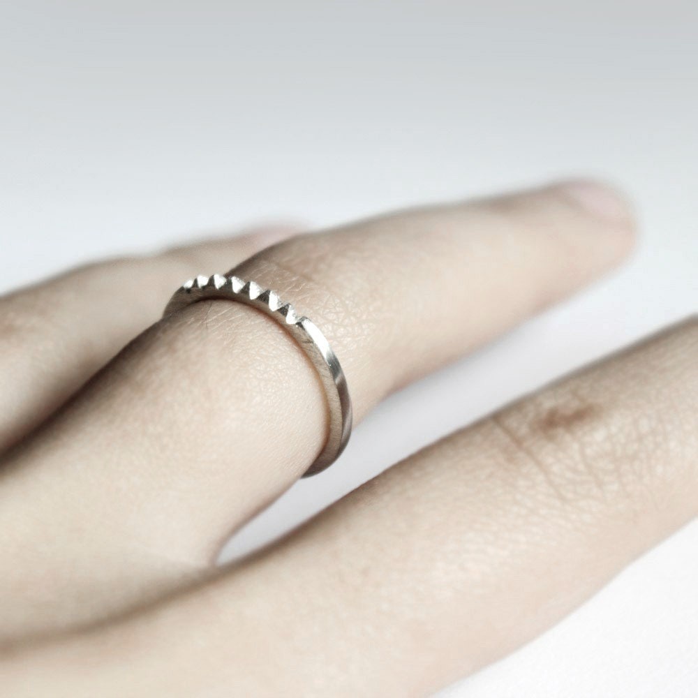 Pyramid row . sterling silver tiny studs ring