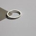 Pyramid row . sterling silver tiny studs ring