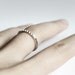 Pyramid row . sterling silver tiny studs ring