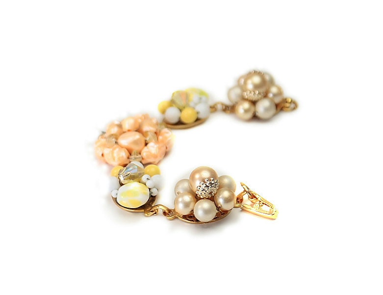 Recycled jewelry.  Vintage earring bracelet . Stunning and one of a kind. Sunrise. Free international shipping