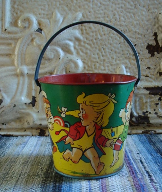 1950s US Metal Toys Big Eye Children at the Beach Sand Pail