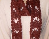 Burgundy hand crocheted lacy scarf.