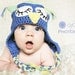 Crochet sleepy owl beanie ear flap hat in blues, greens and yellows - Twit Twoo..