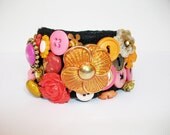 Statement bracelet embroidered orange pink